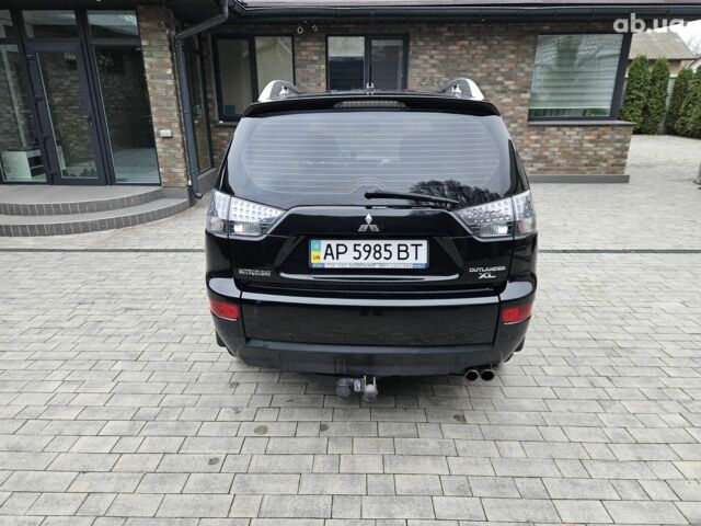 Чорний Міцубісі Аутлендер ХЛ, об'ємом двигуна 3 л та пробігом 238 тис. км за 10800 $, фото 5 на Automoto.ua
