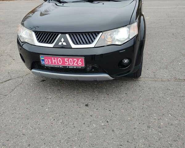 Черный Мицубиси Аутлендер ХЛ, объемом двигателя 2 л и пробегом 218 тыс. км за 10500 $, фото 12 на Automoto.ua