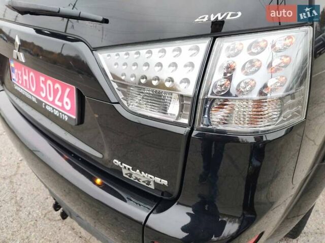 Черный Мицубиси Аутлендер ХЛ, объемом двигателя 2 л и пробегом 218 тыс. км за 10500 $, фото 9 на Automoto.ua