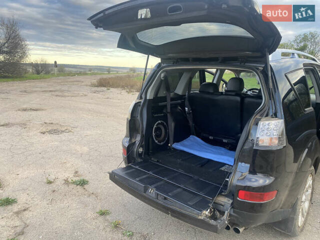 Черный Мицубиси Аутлендер ХЛ, объемом двигателя 1.97 л и пробегом 207 тыс. км за 8200 $, фото 8 на Automoto.ua