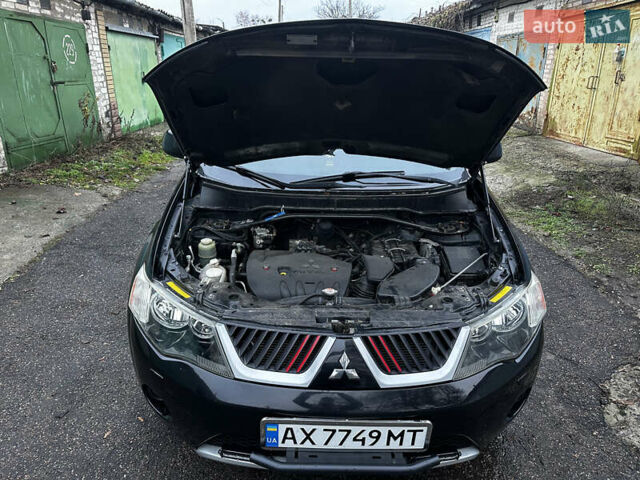 Чорний Міцубісі Аутлендер ХЛ, об'ємом двигуна 2.4 л та пробігом 283 тис. км за 8900 $, фото 29 на Automoto.ua