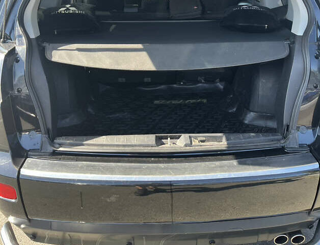 Черный Мицубиси Аутлендер ХЛ, объемом двигателя 3 л и пробегом 169 тыс. км за 9300 $, фото 11 на Automoto.ua