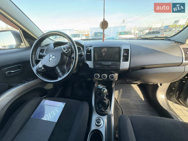 Черный Мицубиси Аутлендер ХЛ, объемом двигателя 2 л и пробегом 264 тыс. км за 7950 $, фото 11 на Automoto.ua
