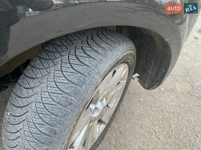 Черный Мицубиси Аутлендер ХЛ, объемом двигателя 1.97 л и пробегом 207 тыс. км за 8200 $, фото 14 на Automoto.ua