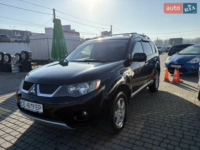 Черный Мицубиси Аутлендер ХЛ, объемом двигателя 2 л и пробегом 264 тыс. км за 7950 $, фото 7 на Automoto.ua