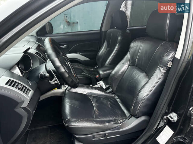 Чорний Міцубісі Аутлендер ХЛ, об'ємом двигуна 2.4 л та пробігом 283 тис. км за 8900 $, фото 18 на Automoto.ua