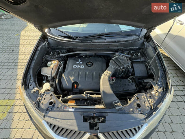 Черный Мицубиси Аутлендер ХЛ, объемом двигателя 2 л и пробегом 264 тыс. км за 7950 $, фото 16 на Automoto.ua