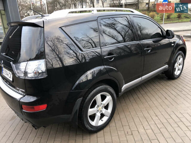 Черный Мицубиси Аутлендер ХЛ, объемом двигателя 3 л и пробегом 207 тыс. км за 9300 $, фото 8 на Automoto.ua