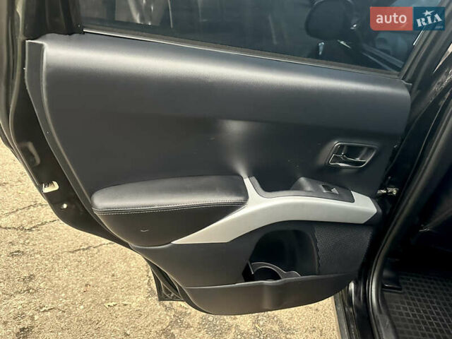 Черный Мицубиси Аутлендер ХЛ, объемом двигателя 2.4 л и пробегом 230 тыс. км за 8500 $, фото 21 на Automoto.ua