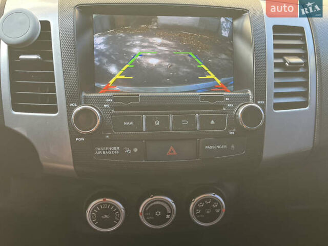 Черный Мицубиси Аутлендер ХЛ, объемом двигателя 3 л и пробегом 169 тыс. км за 9300 $, фото 16 на Automoto.ua