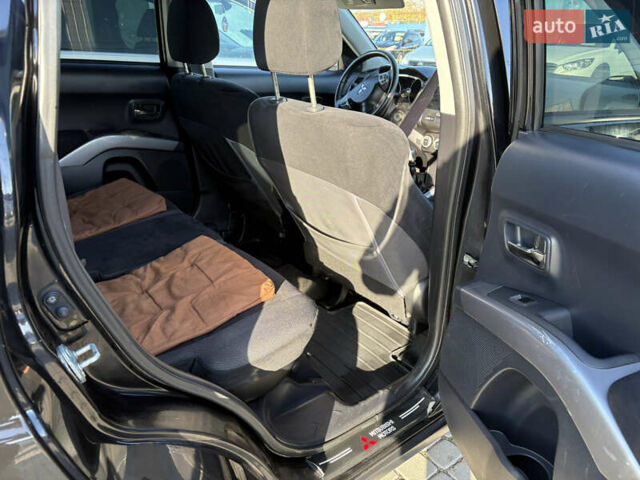 Черный Мицубиси Аутлендер ХЛ, объемом двигателя 2 л и пробегом 264 тыс. км за 7950 $, фото 9 на Automoto.ua