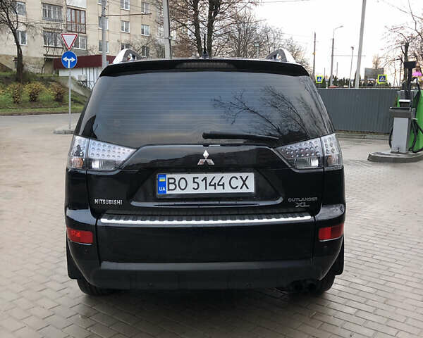 Черный Мицубиси Аутлендер ХЛ, объемом двигателя 3 л и пробегом 207 тыс. км за 9300 $, фото 10 на Automoto.ua