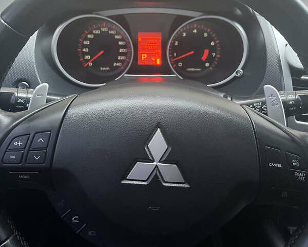 Черный Мицубиси Аутлендер ХЛ, объемом двигателя 3 л и пробегом 169 тыс. км за 9300 $, фото 2 на Automoto.ua