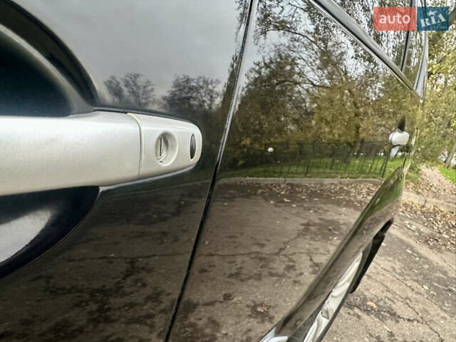 Черный Мицубиси Аутлендер ХЛ, объемом двигателя 2.4 л и пробегом 230 тыс. км за 8500 $, фото 11 на Automoto.ua