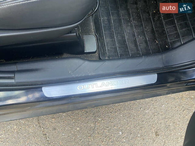 Черный Мицубиси Аутлендер ХЛ, объемом двигателя 1.97 л и пробегом 207 тыс. км за 8200 $, фото 18 на Automoto.ua