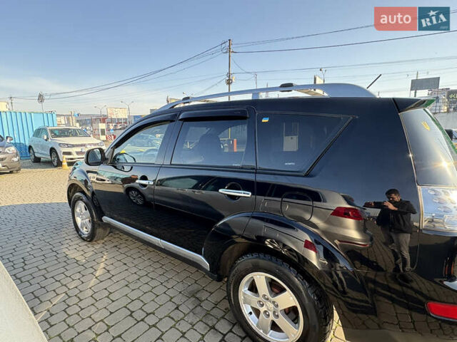Черный Мицубиси Аутлендер ХЛ, объемом двигателя 2 л и пробегом 264 тыс. км за 7950 $, фото 6 на Automoto.ua