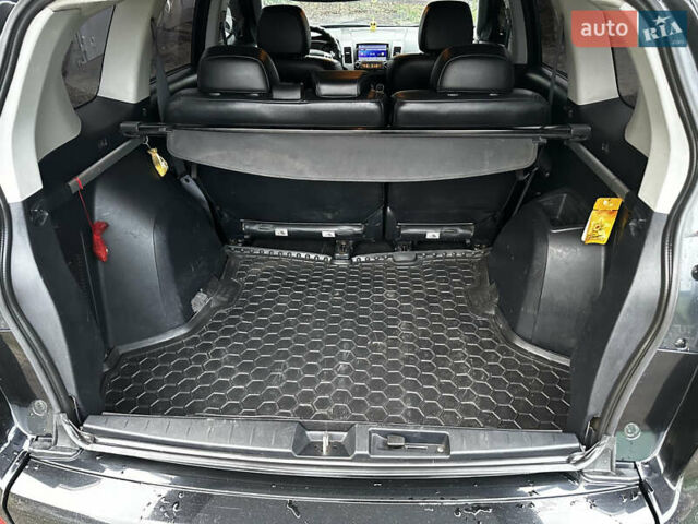 Черный Мицубиси Аутлендер ХЛ, объемом двигателя 2.4 л и пробегом 283 тыс. км за 8900 $, фото 25 на Automoto.ua