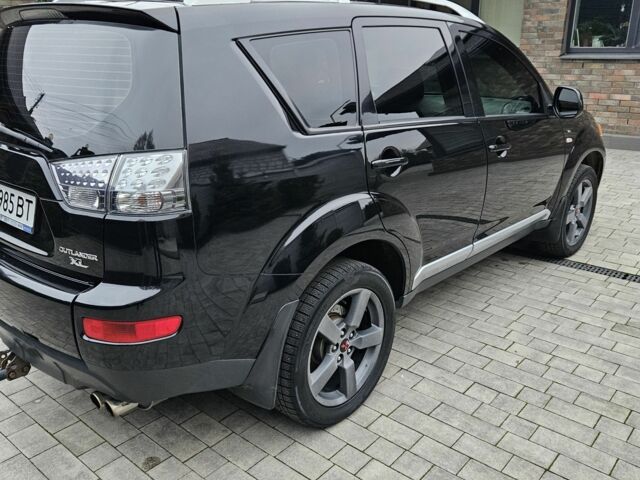 Чорний Міцубісі Аутлендер ХЛ, об'ємом двигуна 3 л та пробігом 238 тис. км за 10800 $, фото 10 на Automoto.ua