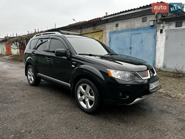 Черный Мицубиси Аутлендер ХЛ, объемом двигателя 2.4 л и пробегом 283 тыс. км за 8900 $, фото 8 на Automoto.ua