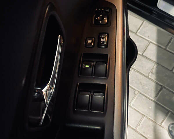 Черный Мицубиси Аутлендер ХЛ, объемом двигателя 3 л и пробегом 253 тыс. км за 9800 $, фото 3 на Automoto.ua