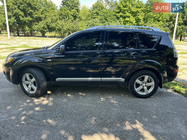 Черный Мицубиси Аутлендер ХЛ, объемом двигателя 3 л и пробегом 280 тыс. км за 9200 $, фото 2 на Automoto.ua