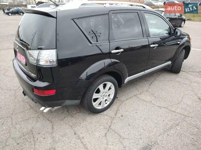 Черный Мицубиси Аутлендер ХЛ, объемом двигателя 2 л и пробегом 218 тыс. км за 10500 $, фото 8 на Automoto.ua