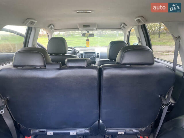 Черный Мицубиси Аутлендер ХЛ, объемом двигателя 1.97 л и пробегом 207 тыс. км за 8200 $, фото 6 на Automoto.ua