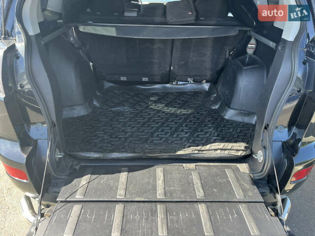 Черный Мицубиси Аутлендер ХЛ, объемом двигателя 3 л и пробегом 169 тыс. км за 9300 $, фото 12 на Automoto.ua