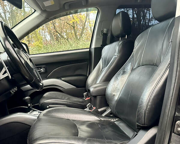 Черный Мицубиси Аутлендер ХЛ, объемом двигателя 2.4 л и пробегом 230 тыс. км за 8500 $, фото 13 на Automoto.ua