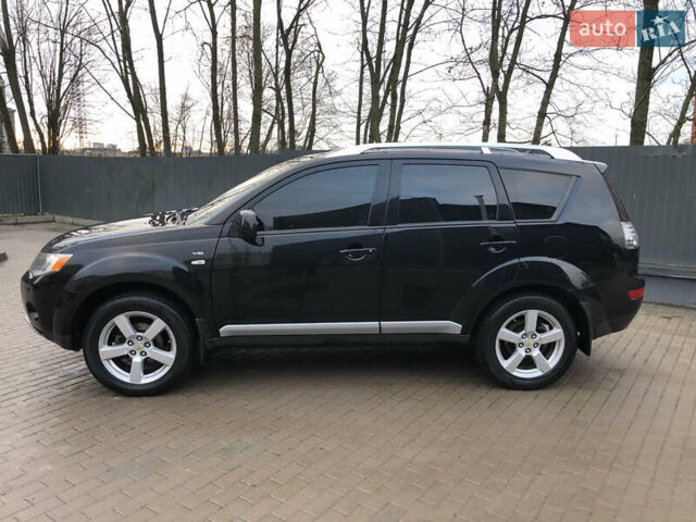 Черный Мицубиси Аутлендер ХЛ, объемом двигателя 3 л и пробегом 207 тыс. км за 9300 $, фото 2 на Automoto.ua