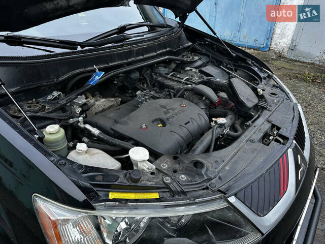 Чорний Міцубісі Аутлендер ХЛ, об'ємом двигуна 2.4 л та пробігом 283 тис. км за 8900 $, фото 33 на Automoto.ua