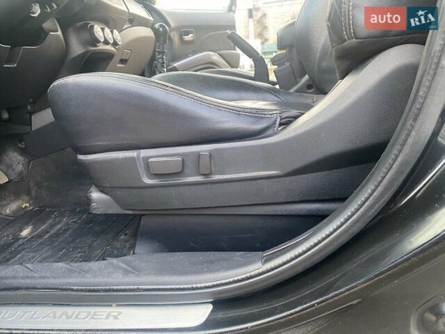 Черный Мицубиси Аутлендер ХЛ, объемом двигателя 1.97 л и пробегом 207 тыс. км за 8200 $, фото 20 на Automoto.ua
