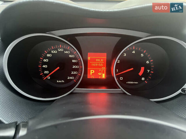 Черный Мицубиси Аутлендер ХЛ, объемом двигателя 3 л и пробегом 169 тыс. км за 9300 $, фото 1 на Automoto.ua