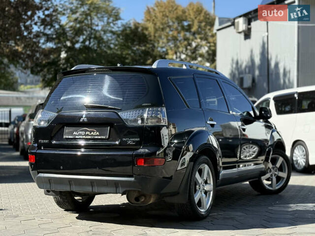 Чорний Міцубісі Аутлендер ХЛ, об'ємом двигуна 2.36 л та пробігом 286 тис. км за 7900 $, фото 19 на Automoto.ua
