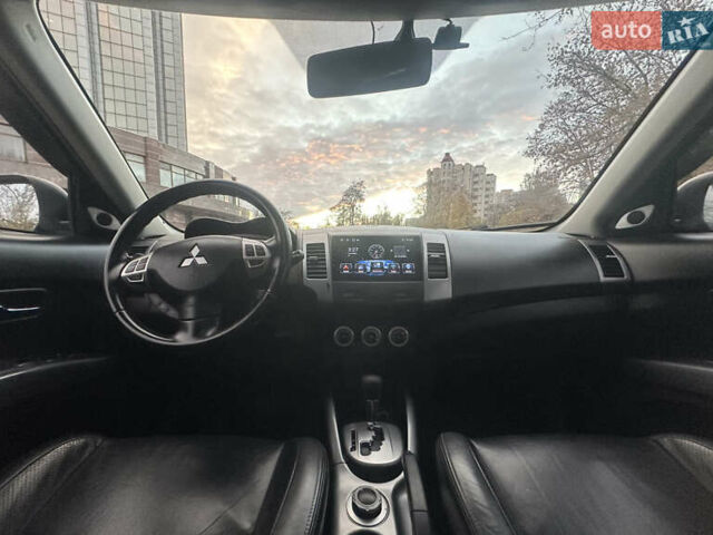 Черный Мицубиси Аутлендер ХЛ, объемом двигателя 2.4 л и пробегом 230 тыс. км за 8500 $, фото 15 на Automoto.ua