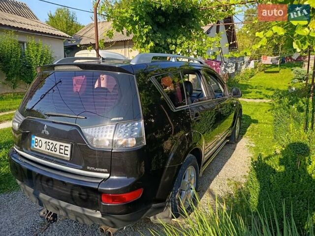 Черный Мицубиси Аутлендер ХЛ, объемом двигателя 2 л и пробегом 367 тыс. км за 8500 $, фото 4 на Automoto.ua