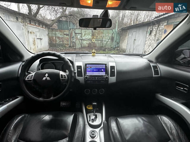 Черный Мицубиси Аутлендер ХЛ, объемом двигателя 2.4 л и пробегом 283 тыс. км за 8900 $, фото 21 на Automoto.ua