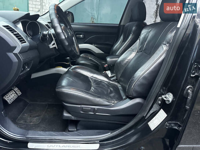 Чорний Міцубісі Аутлендер ХЛ, об'ємом двигуна 2.4 л та пробігом 283 тис. км за 8900 $, фото 28 на Automoto.ua