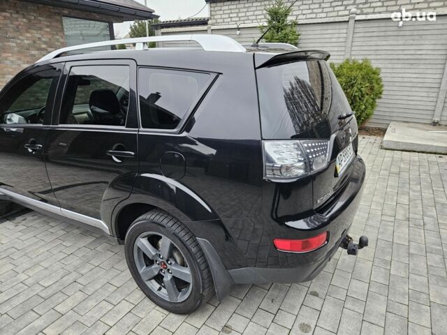 Чорний Міцубісі Аутлендер ХЛ, об'ємом двигуна 3 л та пробігом 238 тис. км за 10800 $, фото 3 на Automoto.ua
