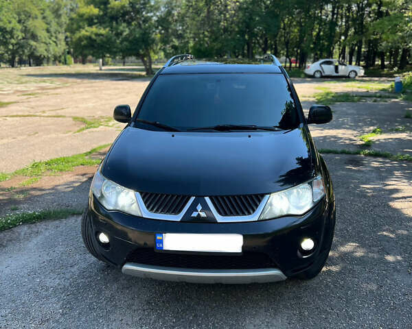 Черный Мицубиси Аутлендер ХЛ, объемом двигателя 3 л и пробегом 280 тыс. км за 9200 $, фото 7 на Automoto.ua