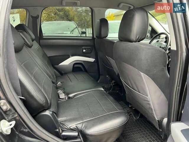 Черный Мицубиси Аутлендер ХЛ, объемом двигателя 3 л и пробегом 245 тыс. км за 9300 $, фото 5 на Automoto.ua