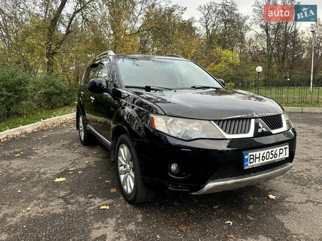 Черный Мицубиси Аутлендер ХЛ, объемом двигателя 2.4 л и пробегом 230 тыс. км за 8500 $, фото 10 на Automoto.ua