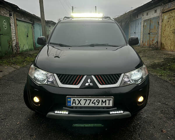 Чорний Міцубісі Аутлендер ХЛ, об'ємом двигуна 2.4 л та пробігом 283 тис. км за 8900 $, фото 2 на Automoto.ua