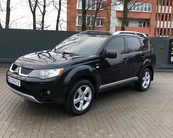 Черный Мицубиси Аутлендер ХЛ, объемом двигателя 3 л и пробегом 207 тыс. км за 9300 $, фото 4 на Automoto.ua