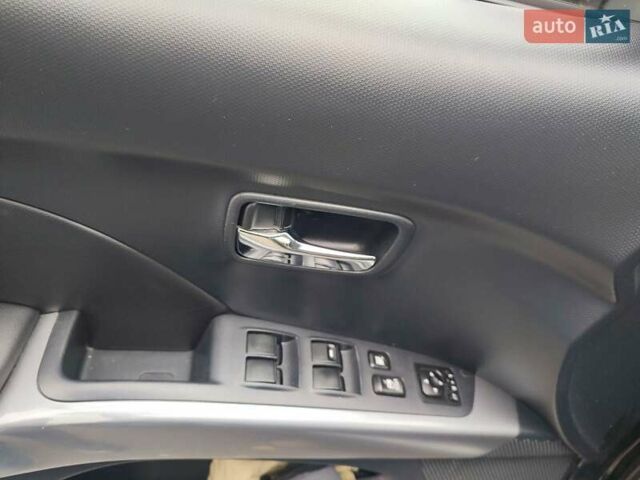 Черный Мицубиси Аутлендер ХЛ, объемом двигателя 2 л и пробегом 218 тыс. км за 10500 $, фото 5 на Automoto.ua