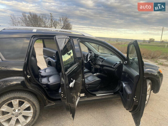 Черный Мицубиси Аутлендер ХЛ, объемом двигателя 1.97 л и пробегом 207 тыс. км за 8200 $, фото 10 на Automoto.ua