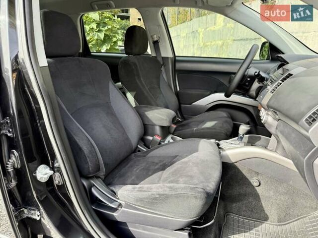 Чорний Міцубісі Аутлендер ХЛ, об'ємом двигуна 2.4 л та пробігом 104 тис. км за 10800 $, фото 8 на Automoto.ua