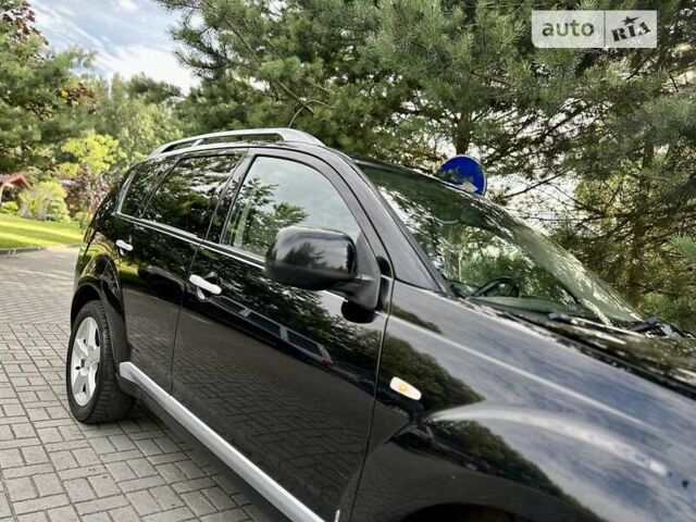Чорний Міцубісі Аутлендер ХЛ, об'ємом двигуна 2 л та пробігом 172 тис. км за 9350 $, фото 11 на Automoto.ua