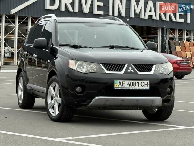 Черный Мицубиси Аутлендер ХЛ, объемом двигателя 2.36 л и пробегом 175 тыс. км за 9700 $, фото 18 на Automoto.ua