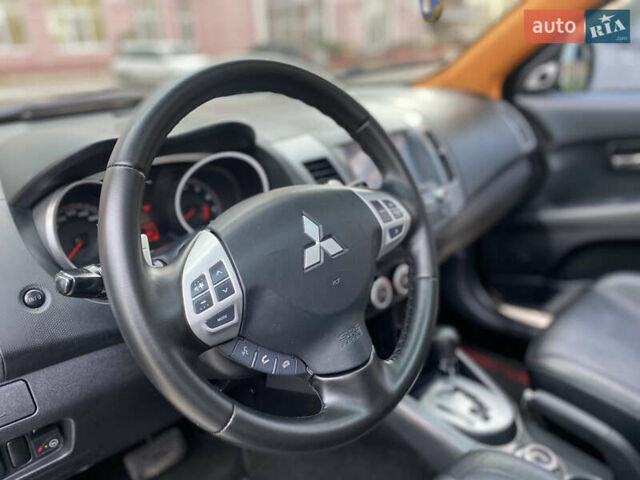 Черный Мицубиси Аутлендер ХЛ, объемом двигателя 3 л и пробегом 154 тыс. км за 8900 $, фото 36 на Automoto.ua